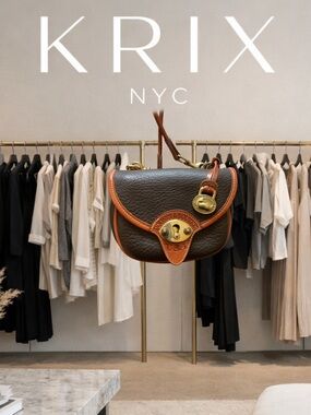 Dooney & Bourke Brown Crossbody/ belt bag with Tan Trim